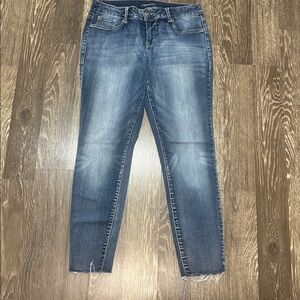 Maurice’s dark denim skinny jeggins with raw him size large regular